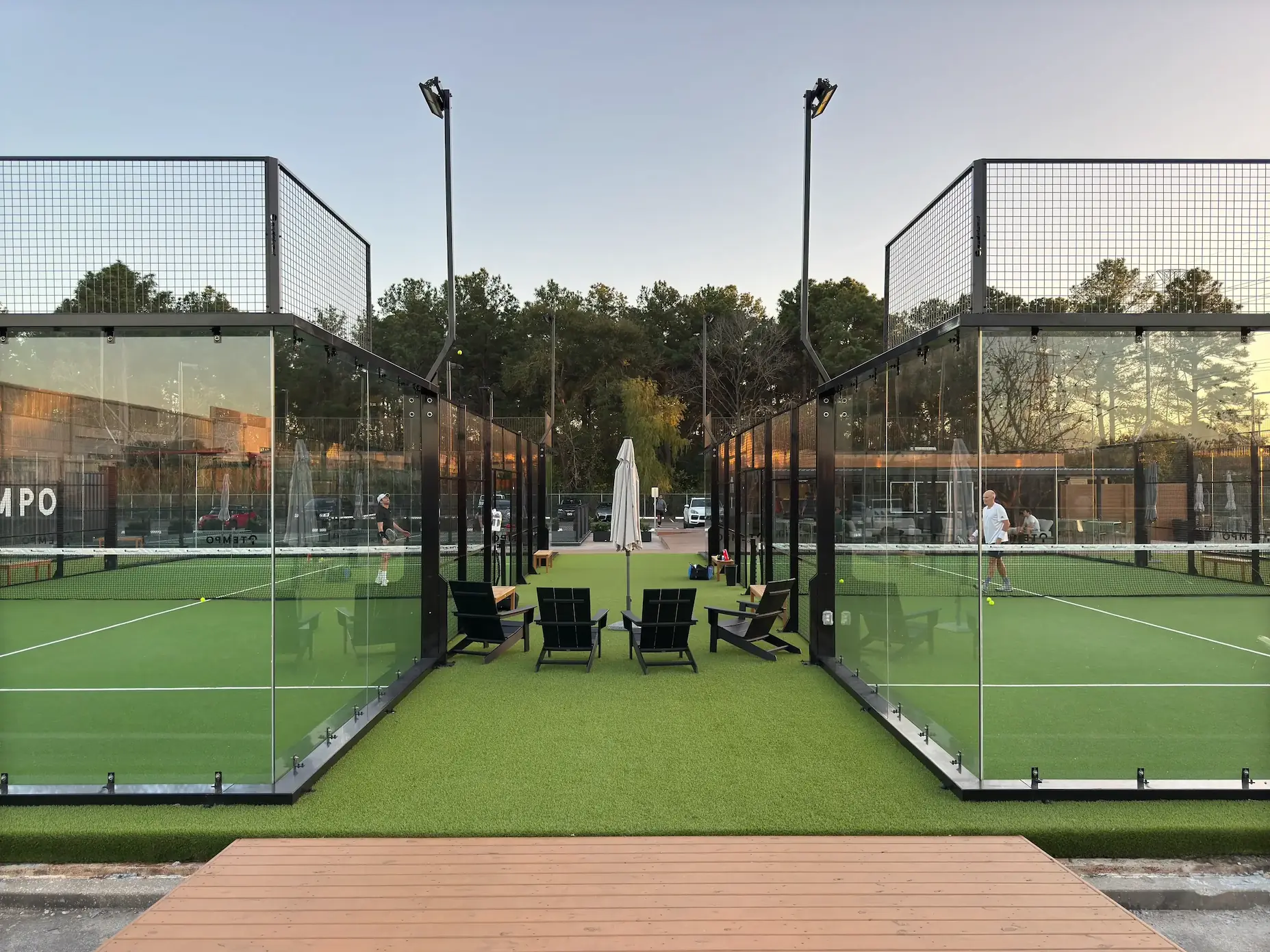 TEMPO outdoor padel courts at dusk